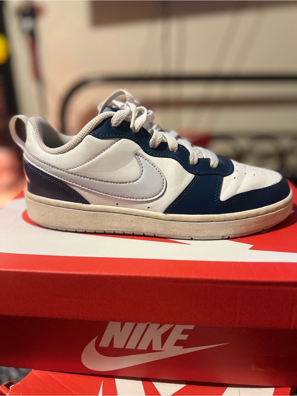 Nike Kids Low-Top Sneakers in White and Navy Blue